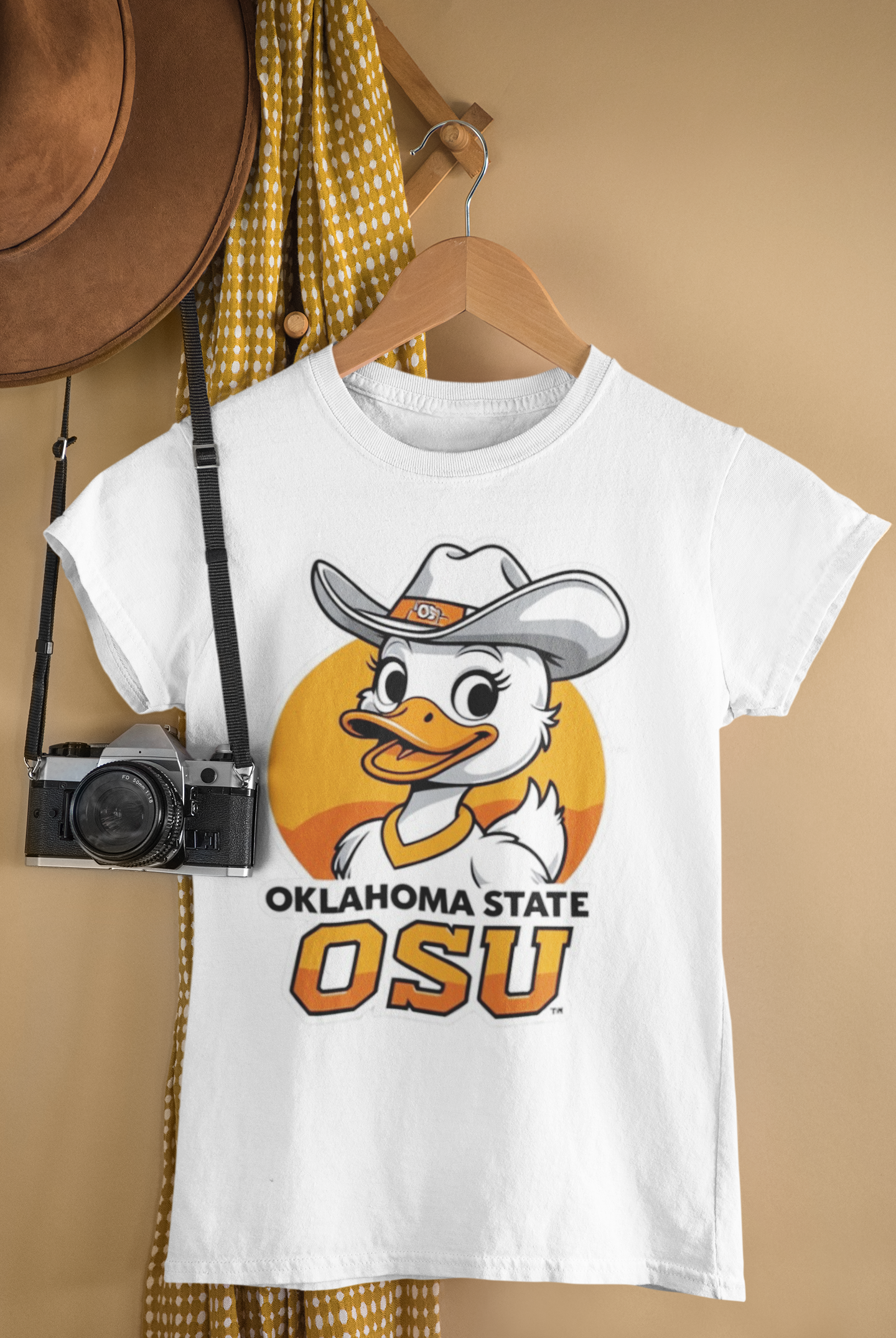 Meet your new feathered friend with Sooner State spirit! This playful cowgirl duck brings Oklahoma charm to any collection, combining whimsical personality with regional pride.