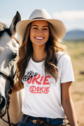 Celebrate your roots with the Okie Dokie Girl tee—a bold statement piece that honors Oklahoma pride with style.