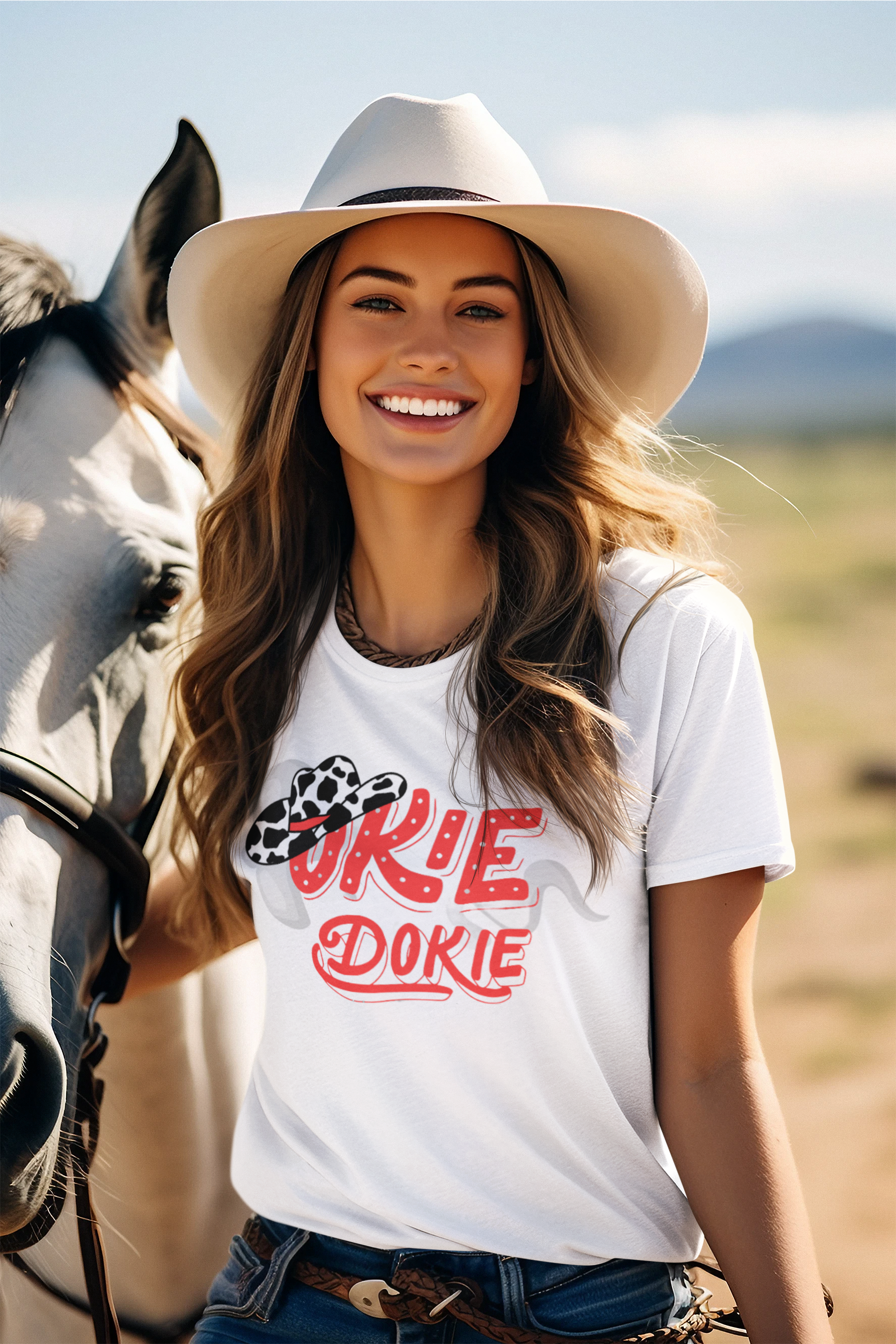 Celebrate your roots with the Okie Dokie Girl tee—a bold statement piece that honors Oklahoma pride with style.